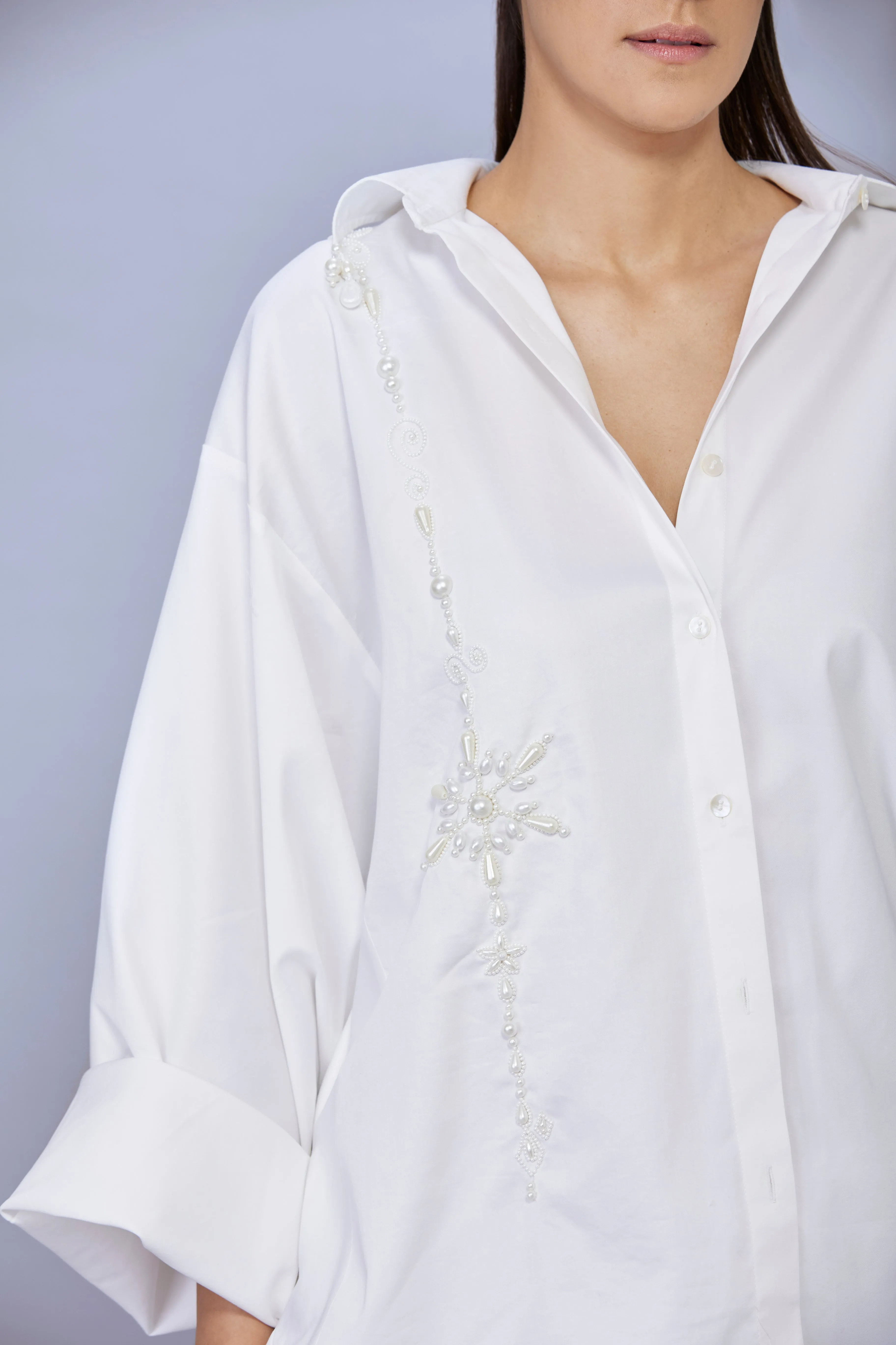 White cotton batwing shirt with one line pearl snowflakes embroidery